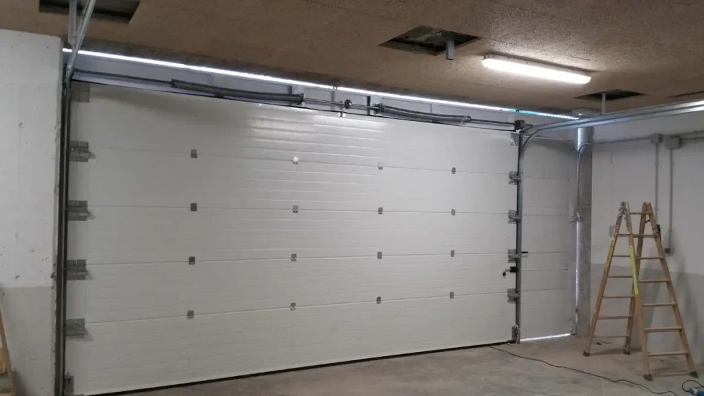 Puertas de Garaje Seccionales 1024x576 - Instalación y Reparación Puertas de Garaje Seccionales