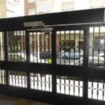 puertas batientes automaticas de cristal barcelona 150x150 - Venta e Instalación Puertas para Comunidades de Vecinos